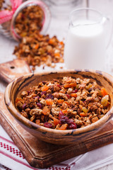 Granola from several types of cereals with nuts,honey,raisins
