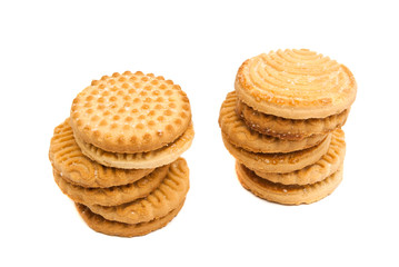 two stacks of cookies on white