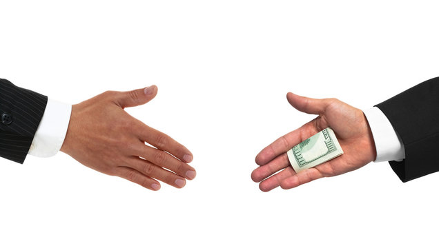 Bribery handshake with money
