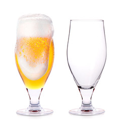 Frosty glass of light beer and empty one