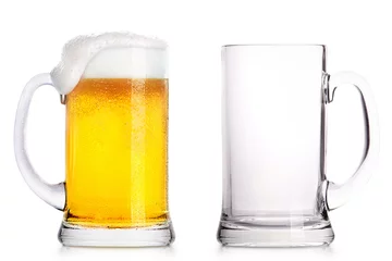 Fototapeten Frosty glass of light beer and empty one © boule1301