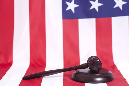 Judge gavel on american flag