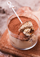 Tiramisu, traditional Italian dessert in a glass