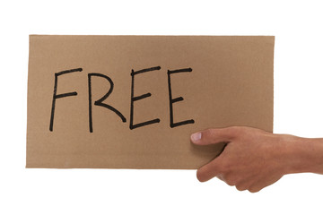 Hand holding up a cardboard free sign