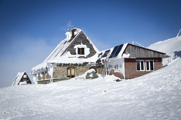 Mountain shelter on top of the hill