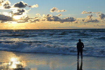 Obraz premium Zachód słońca na plaży