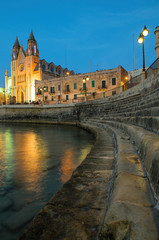 Fototapeta na wymiar Church of Our Lady of Mount Carmel at night, St. Julian, Malta