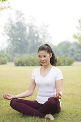 Fototapeta na wymiar Elderly woman Yoga Zen