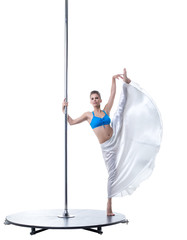 Cute dancer posing in vertical split on pylon