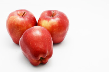 red apple on white ground