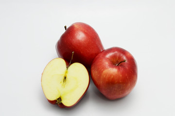 red apple on white ground