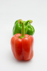 red and green bell pepper on white background
