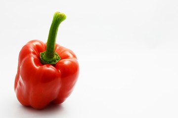 red and green bell pepper on white background