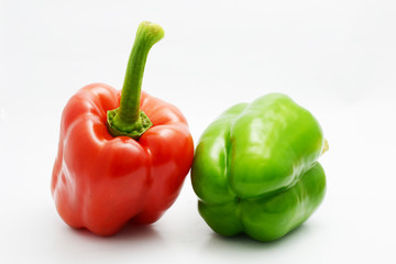 red and green bell pepper on white background