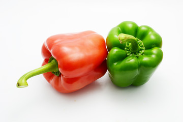 red and green bell pepper on white background