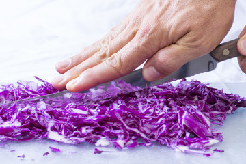 Closeup cutting red cabbage