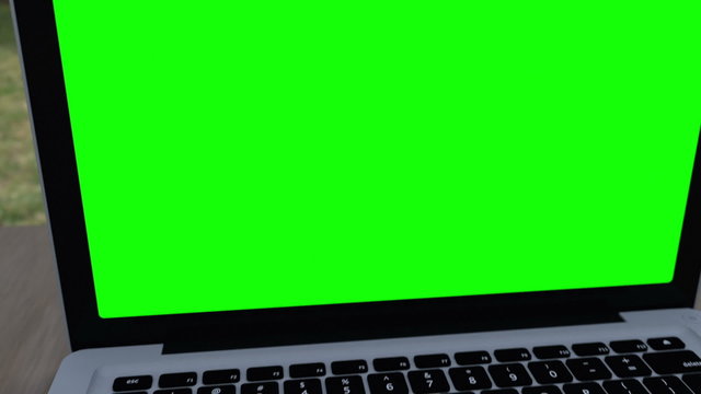 Camera slides into laptop green screen, transition for editors