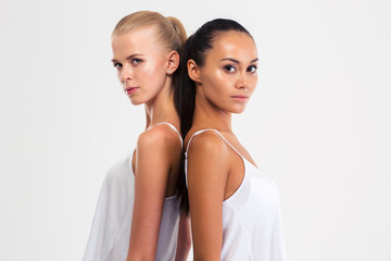 Portrait of a two pretty girls looking at camera