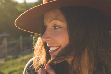 Smiling beautiful woman in hat - fall fashion