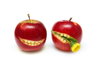 Apples with smiling mouth isolated on white background