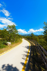 Bicycle Lane in Sarca Valley - Trentino Italy / Bicycle path in the Sarca Valley (Valle del Sarca) through the forest. Trentino Alto Adige, Italy, Europe