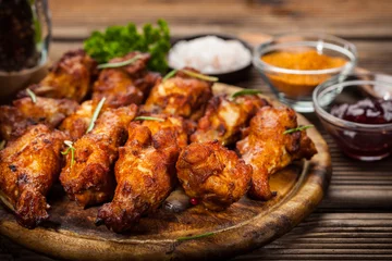 Fototapete Grill / Barbecue BBQ chicken wings with spices and dip