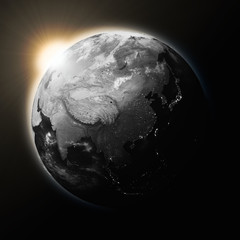 Obraz na płótnie Canvas Sun over Southeast Asia on dark planet Earth