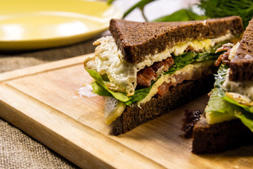 Cut sandwich with bacon