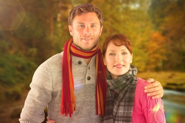 Fototapeta premium Composite image of couple holding each other