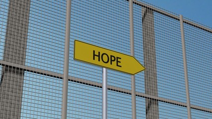 Hope Signpost on metall fence / border fence