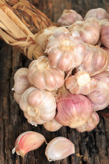 Garlic on old wooden background