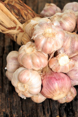 Garlic on old wooden background