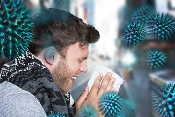 Composite image of close up side view of man blowing nose