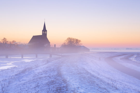 Church in winter at sunrise, Oudendijk, The Netherlands