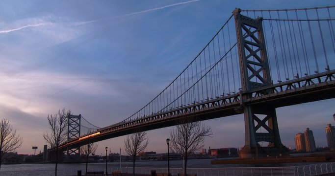 A commuter train crosses the Ben Franklin Bridge near Philadelphia, PA.