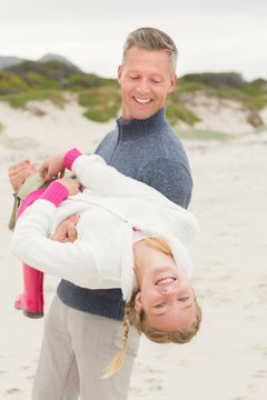 Father giving his daughter lift