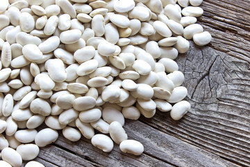 White bean on wooden background