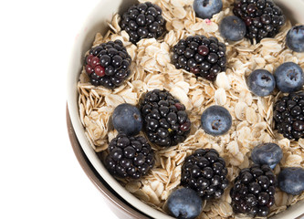 Porridge with blueberries and blackberries