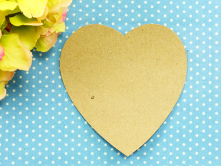 valentine day concept heart on wooden background with beautiful pink flower