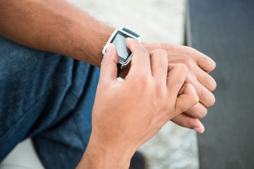 Fototapeta na wymiar Man using smart watch