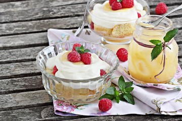 Raspberry trifle with mascarpone cream and lemon curd.Selective focus. 