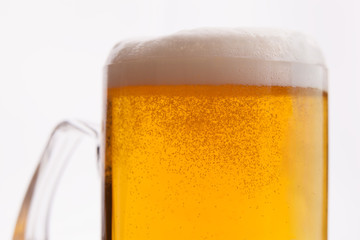 Closeup shot of sparkling light beer