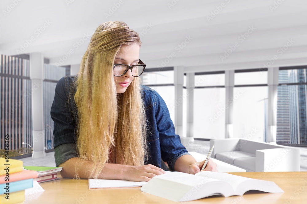 Poster composite image of student studying in the library