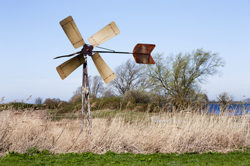 Old windmill still used for under drainage in Tiengemeten, the Netherlands