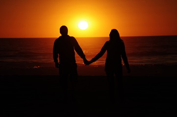 loving couple beach sunset