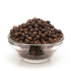 Front view of Organic Black pepper (Piper nigrum) in glass bowl isolated on white background.