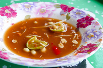 Dirty empty colorful dish after thailand traditional papaya sala