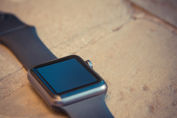 Smart watch on stone background. Mockup