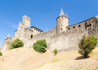 Fototapeta na wymiar Carcassonne, France. View fortifications from the lower town. Fortress of Carcassonne is included in the UNESCO World Heritage List