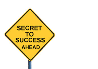 Yellow roadsign with SECRET TO SUCCESS AHEAD message